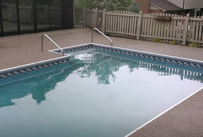 Concrete pool deck with texture finish for a non slip surface in Sylvania, Ohio