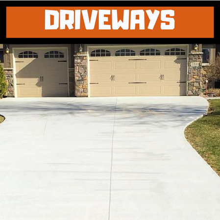 Stamped driveway leading into two car garage