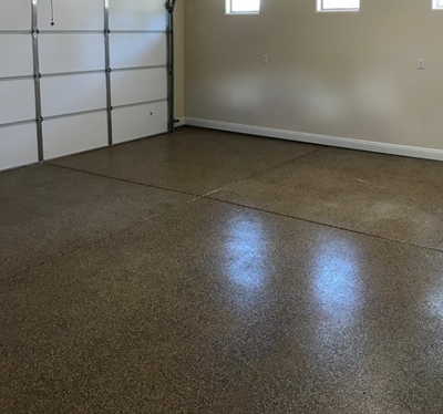 Dark stained concrete garage flooring with texture for no slip surface in Oregon, Ohio 