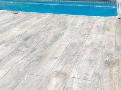 Laminate finish concrete pool decking at Rossford resident's home